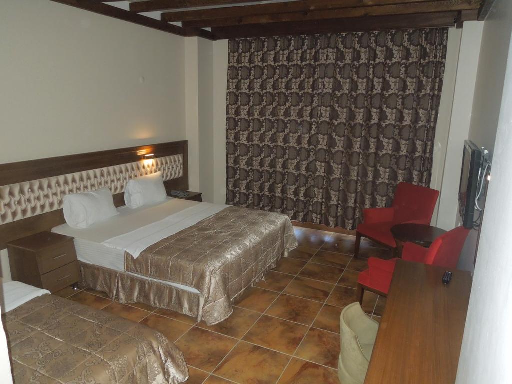 Masi Hotel İmroz Pokoj fotografie