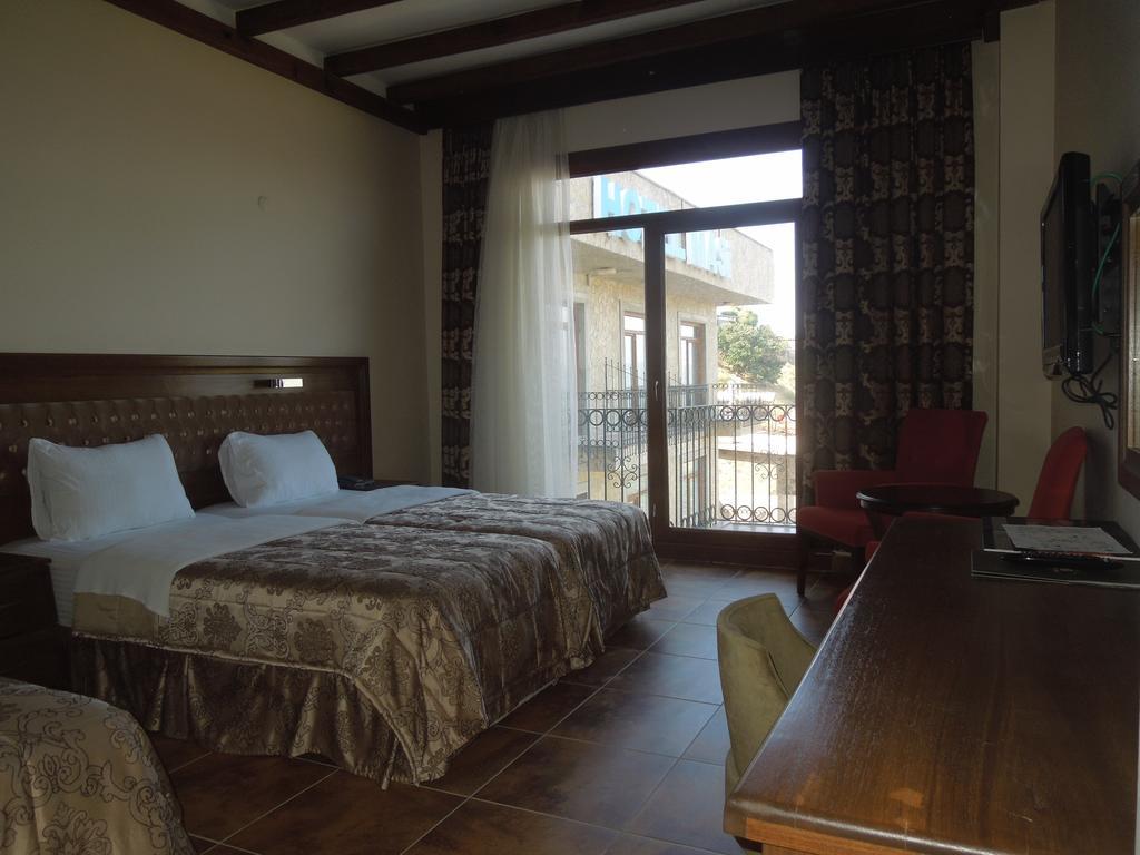 Masi Hotel İmroz Pokoj fotografie