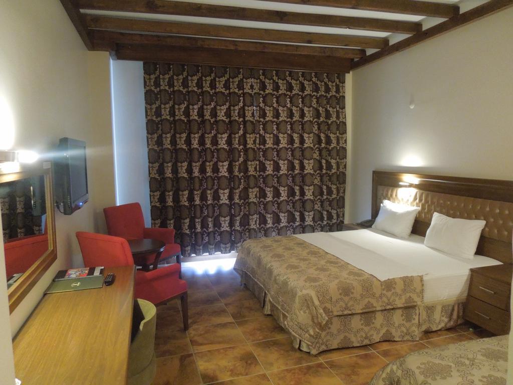 Masi Hotel İmroz Pokoj fotografie