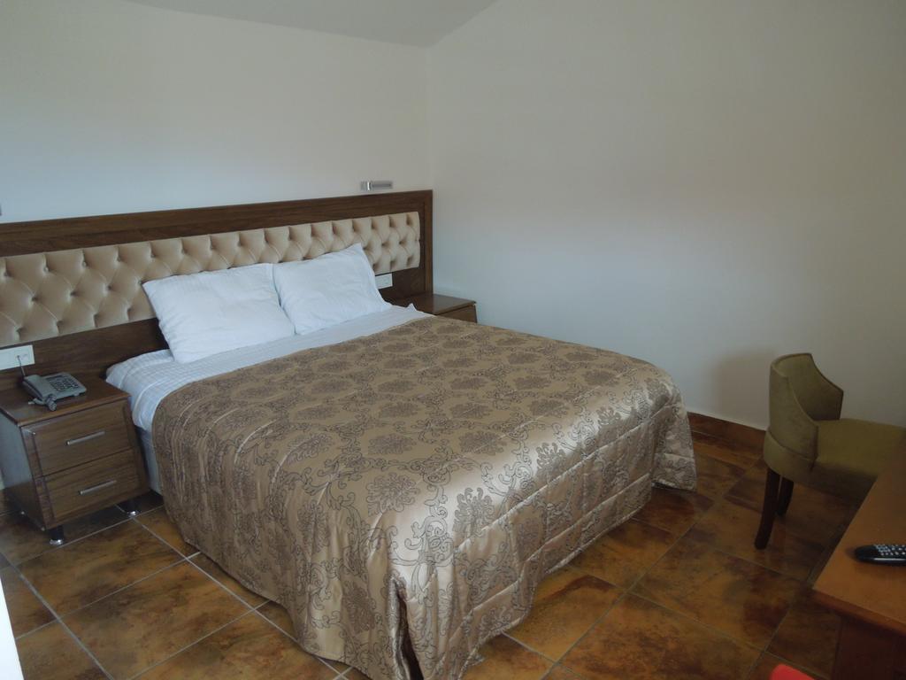 Masi Hotel İmroz Pokoj fotografie